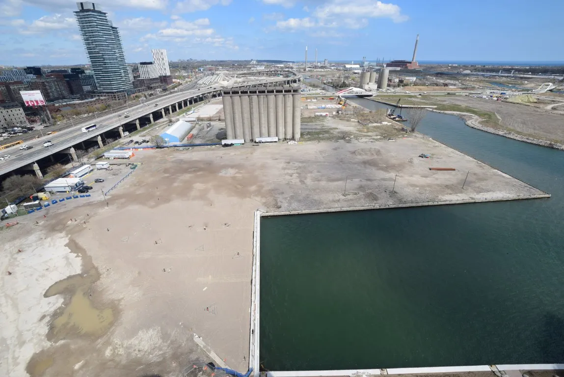 Finalized lakefill at Parliament Slip, showing a fully infilled area with clean grading and preparation for road extension and urban infrastructure. 5/5