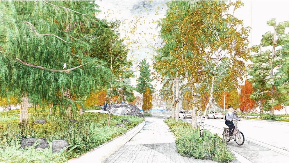 Illustrated view of a landscaped green space flanking a realigned street, with a cyclist riding along a shared path and pedestrians in the distance. The area is filled with trees, shrubs, and natural rock features, creating a lush, park-like atmosphere.
