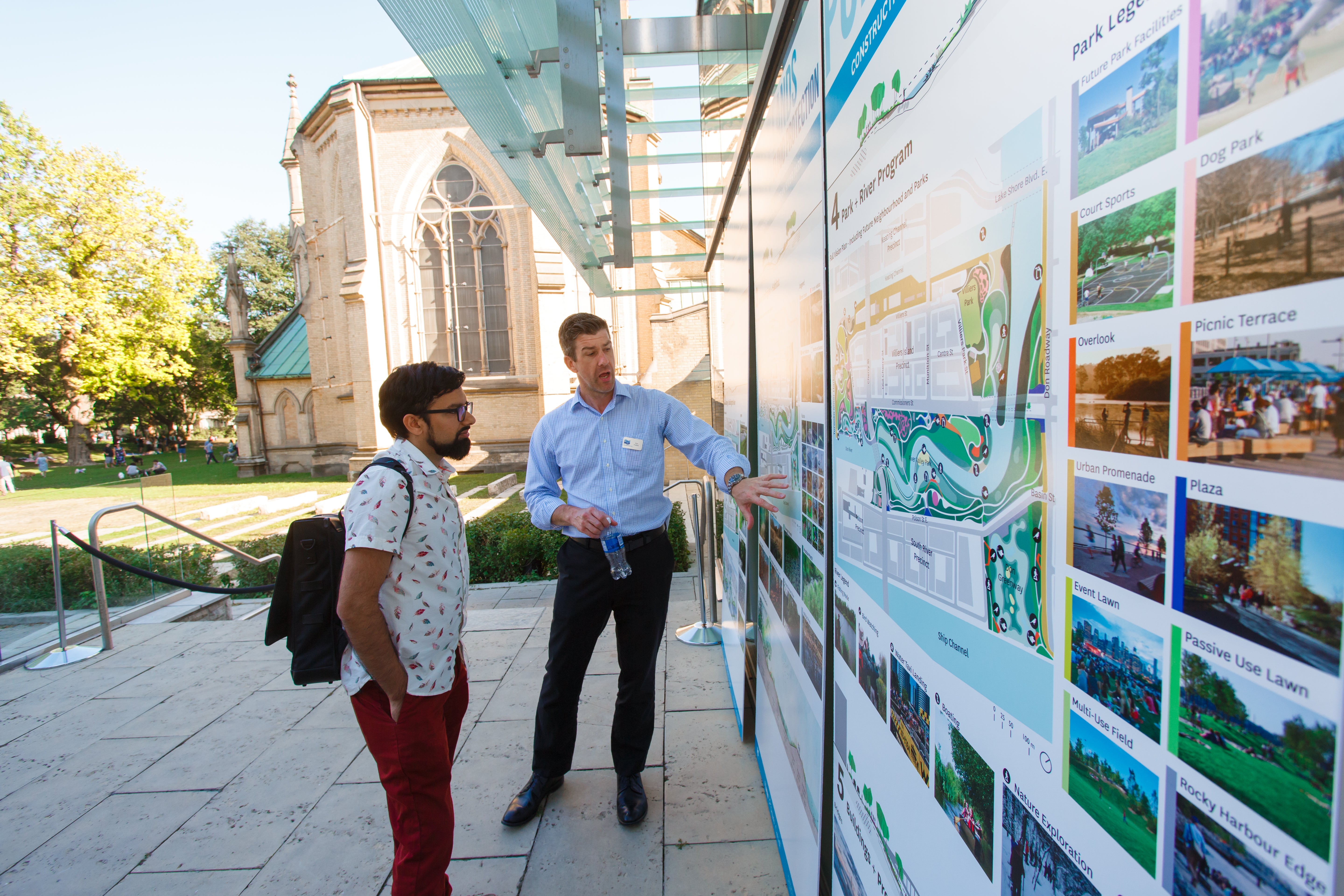 people viewing display boards at a public consultation