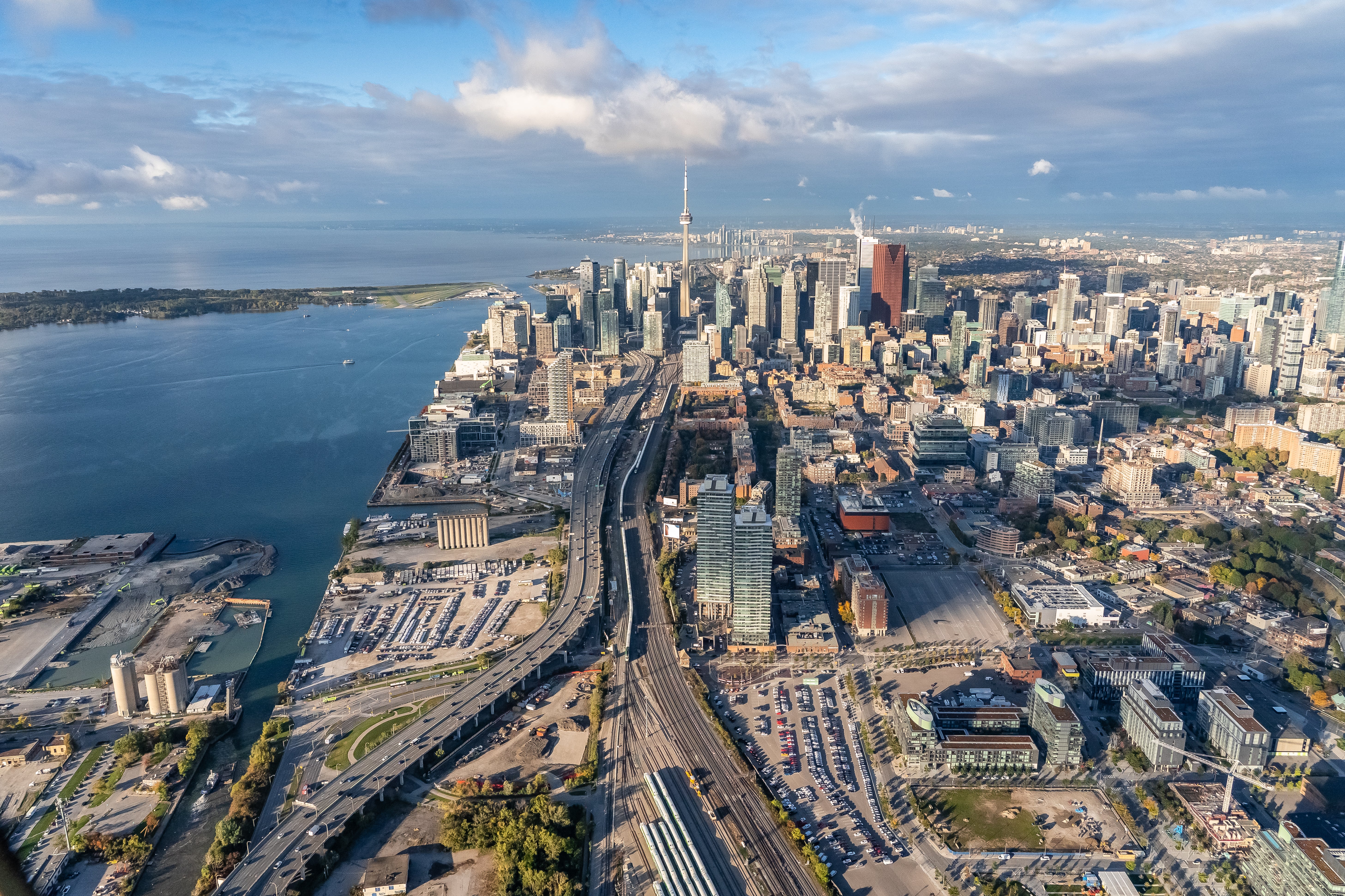 An aerial image of the waterfront and Toronto skyline looking west