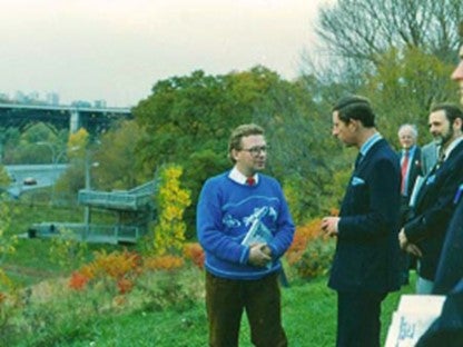 A photo of people standing next to the Don River