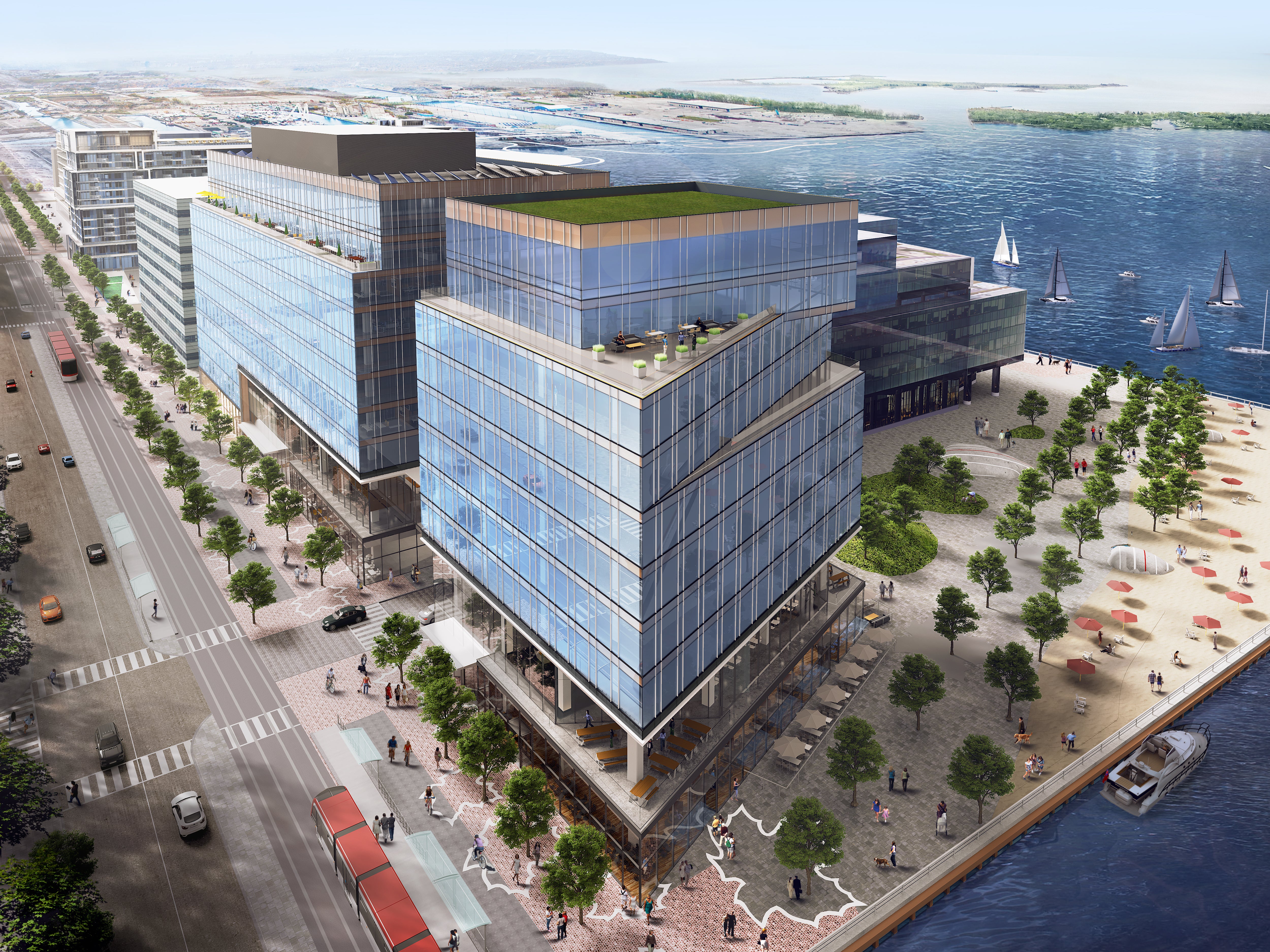 A rendering shows an angular blue-glass building, streetscape on the left and a promenade and beach on the right.