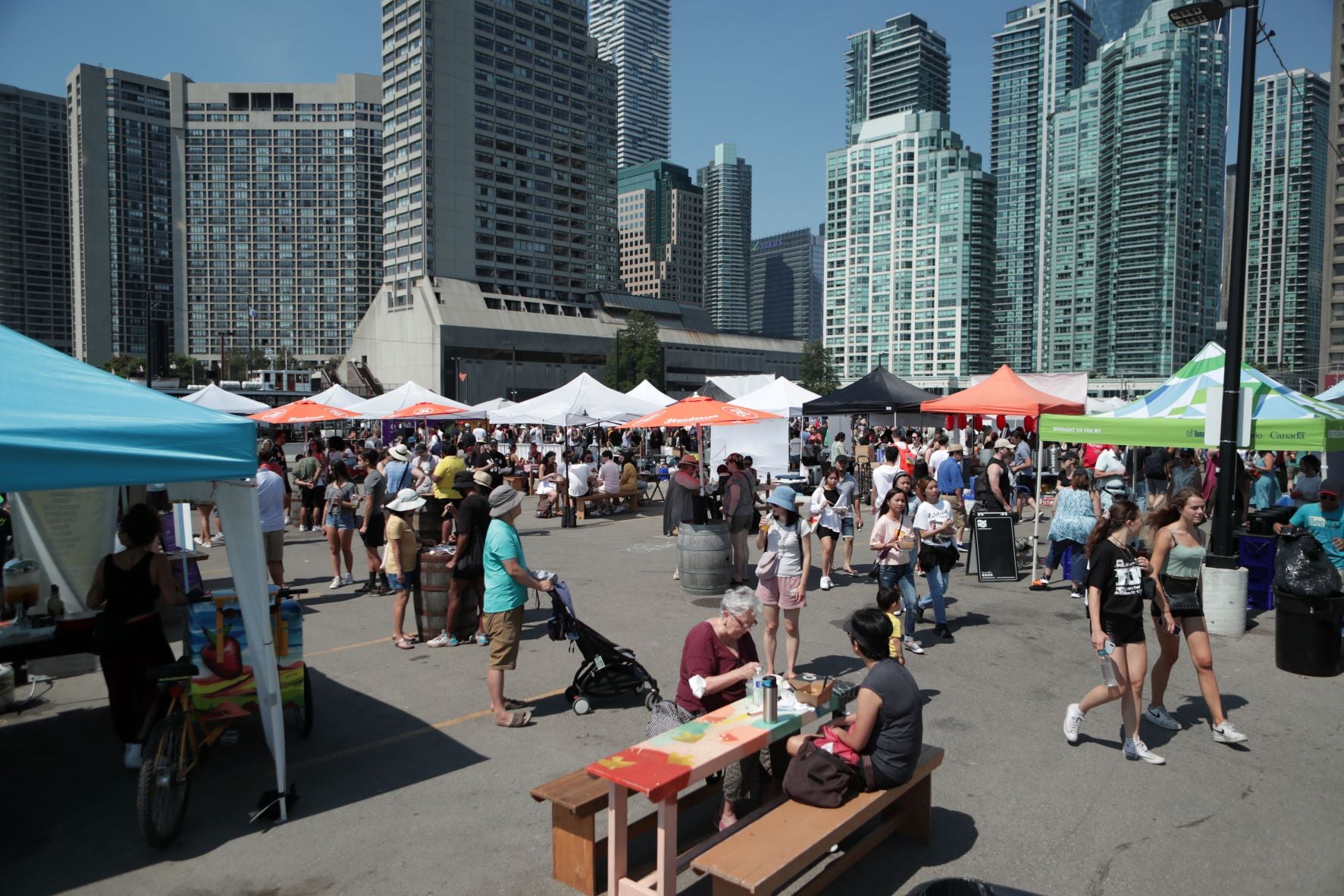 People enjoying a food festival.