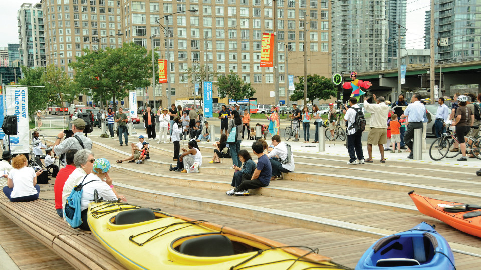 A crowd of people gathered on Rees Wavedeck