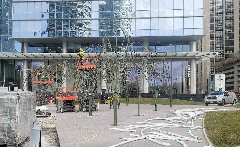 showing installation of a park pavilion feature