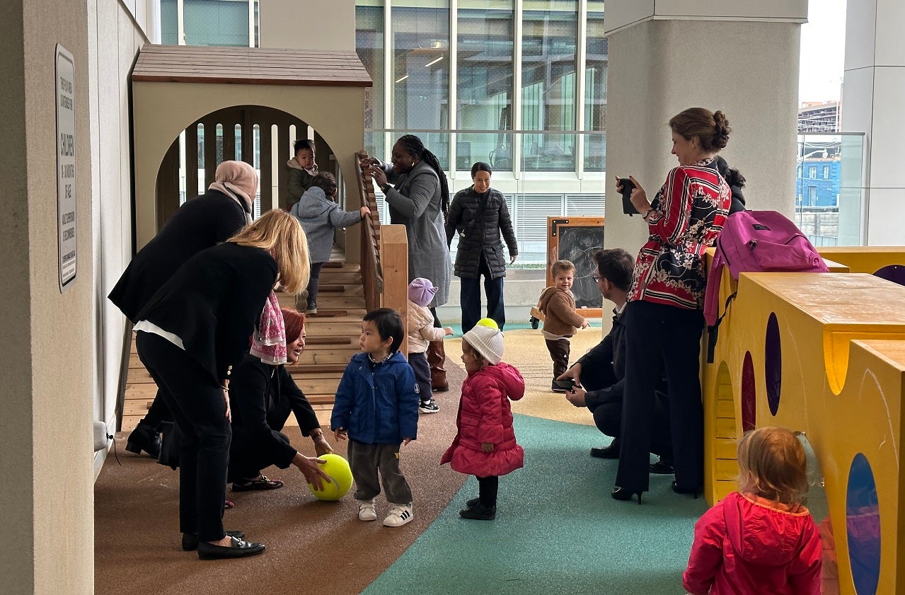 young children and parents inside a child care centre