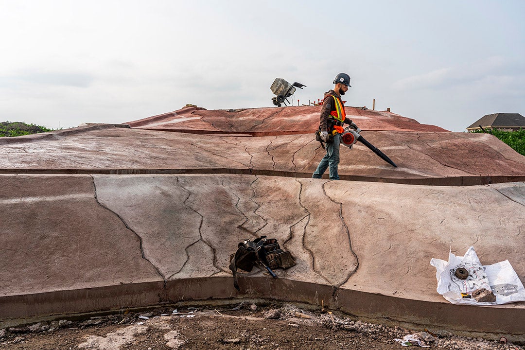 A badlands mockup in a playground with construction workers on it.