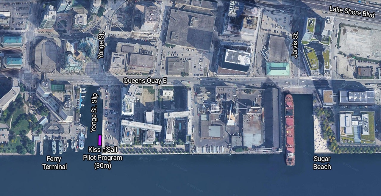 A map showing the location of the Kiss N' Sail pilot program at the foot of the Yonge Street Slip and Water's Edge Promenade, south of Queens Quay.