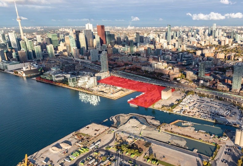 Aerial of downtown core with Quayside land parcel outlined in red.