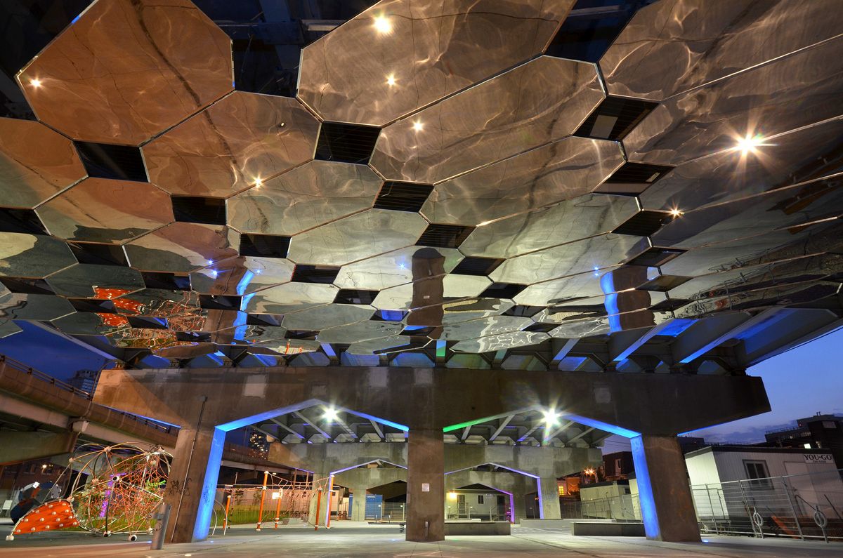 The artwork Mirage at night.