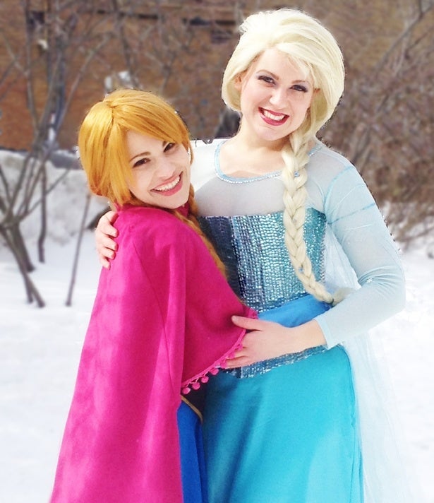 The Frozen Ice Queen and Ice Princess from Disney embracing.