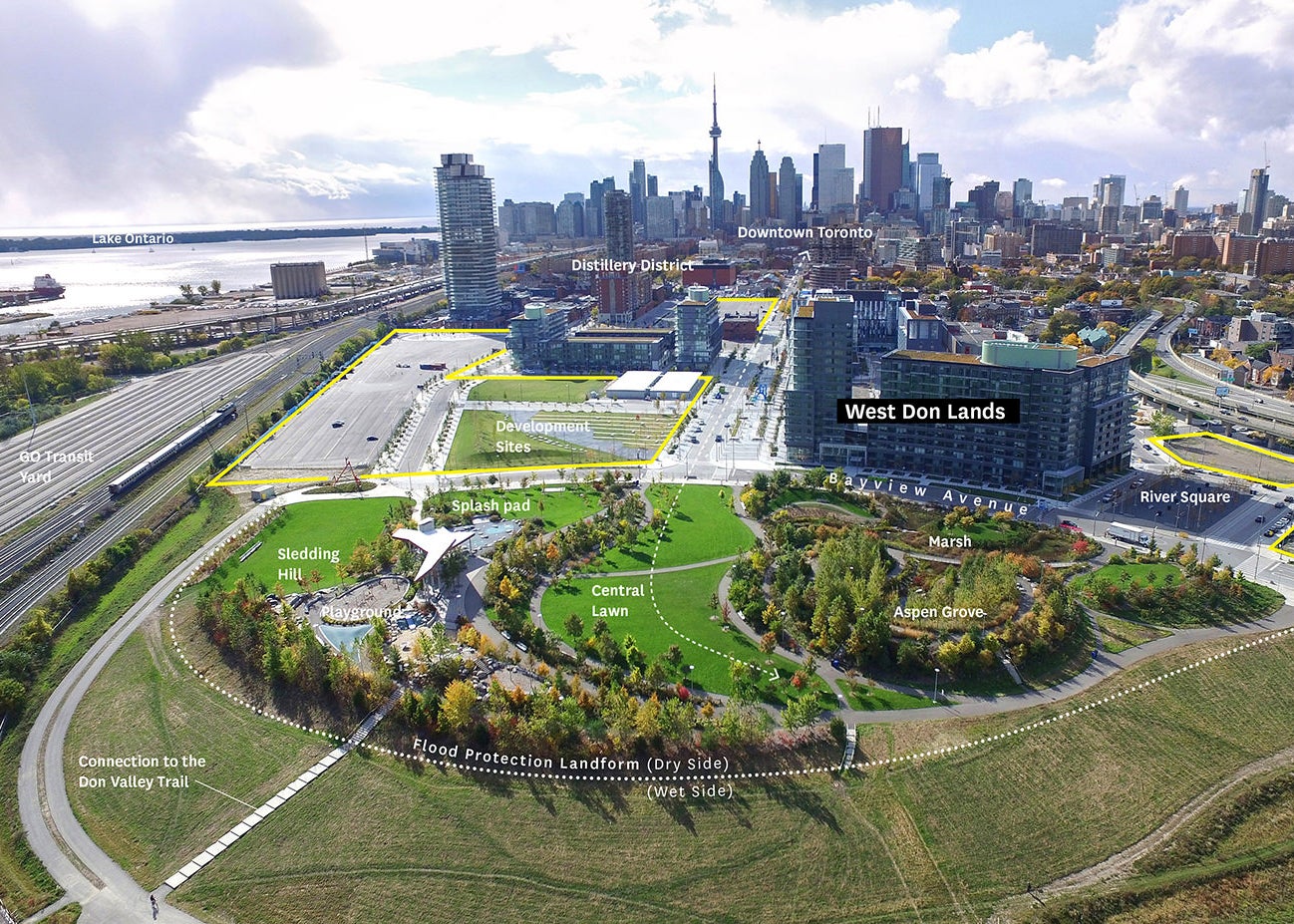 An aerial view of Corktown Common and its unique landscapes that are defined by the flood protection landform.