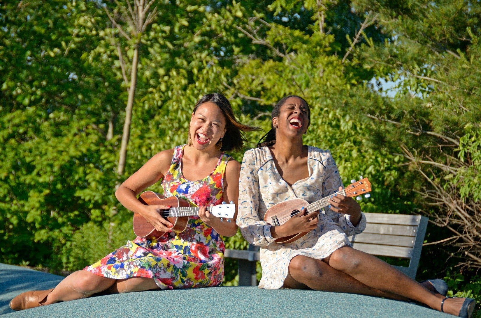 Image of K Funk and Lady Ree playing ukuleles at Corktown Common.