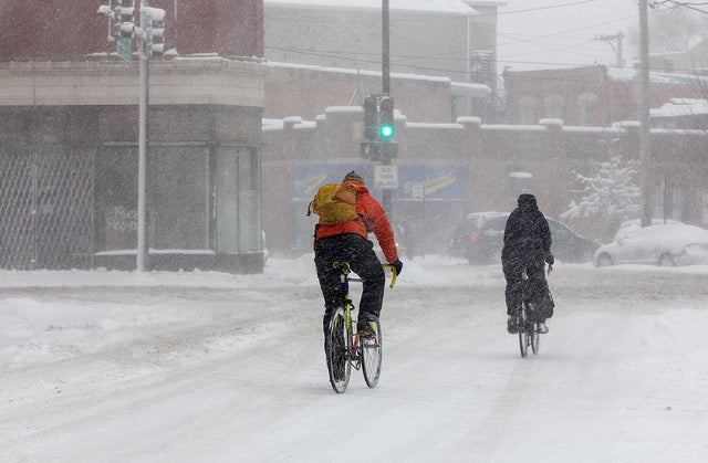 Staying warm and visible is important for winter cyclists.