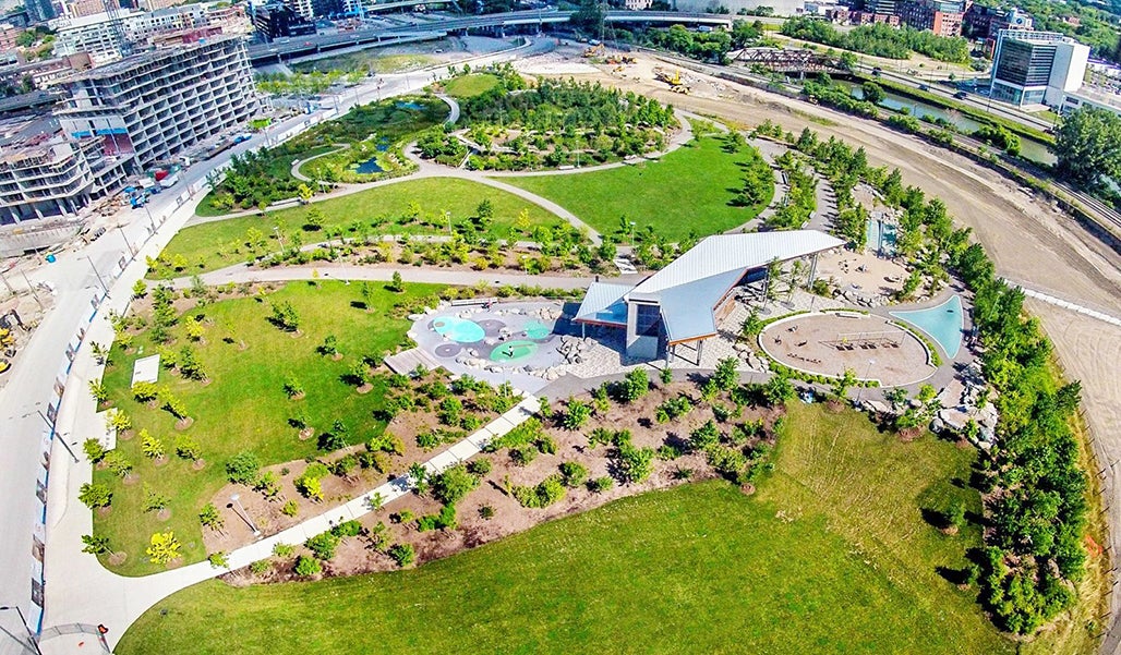 An aerial view of Corktown Common – a city park built on top of a berm that provides essential flood protection.