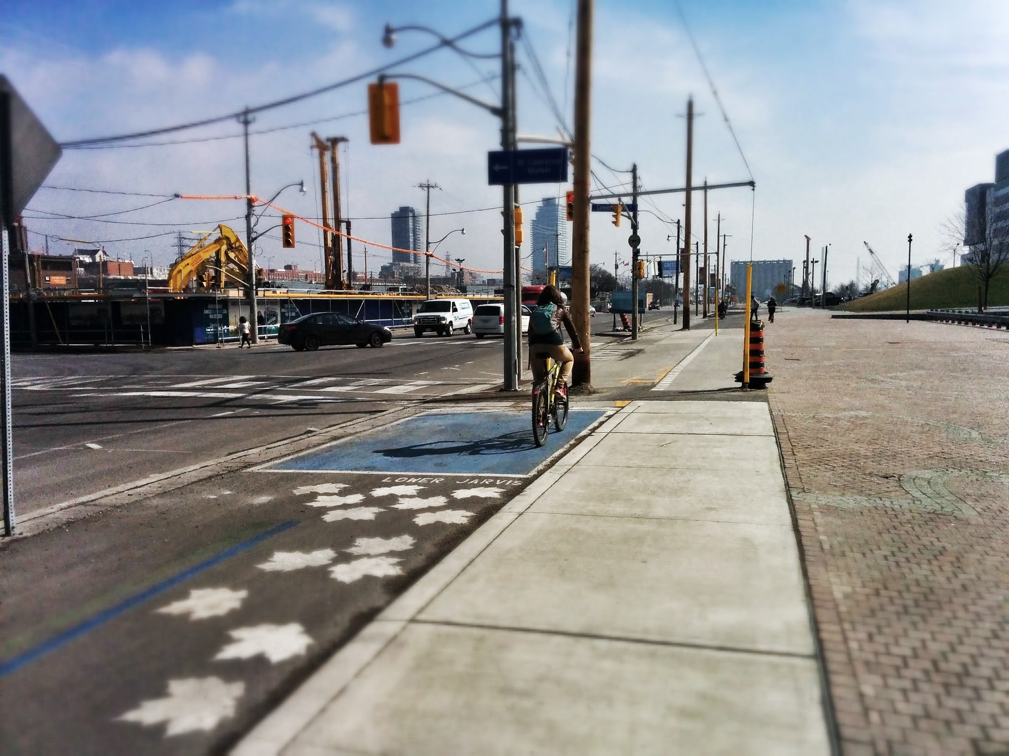 People who bike the Martin Goodman Trail east of Yonge Street have noticed – and complained – of a number of hydro poles recently installed along Queens Quay East. One of them is in the middle of the bike path.