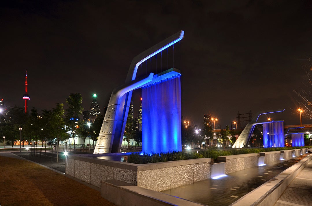 The north side of Sherbourne Common, the signature park in the East Bayfront neighbourhood and the 'Light Showers' art sculpture designed by Jill Anholt
