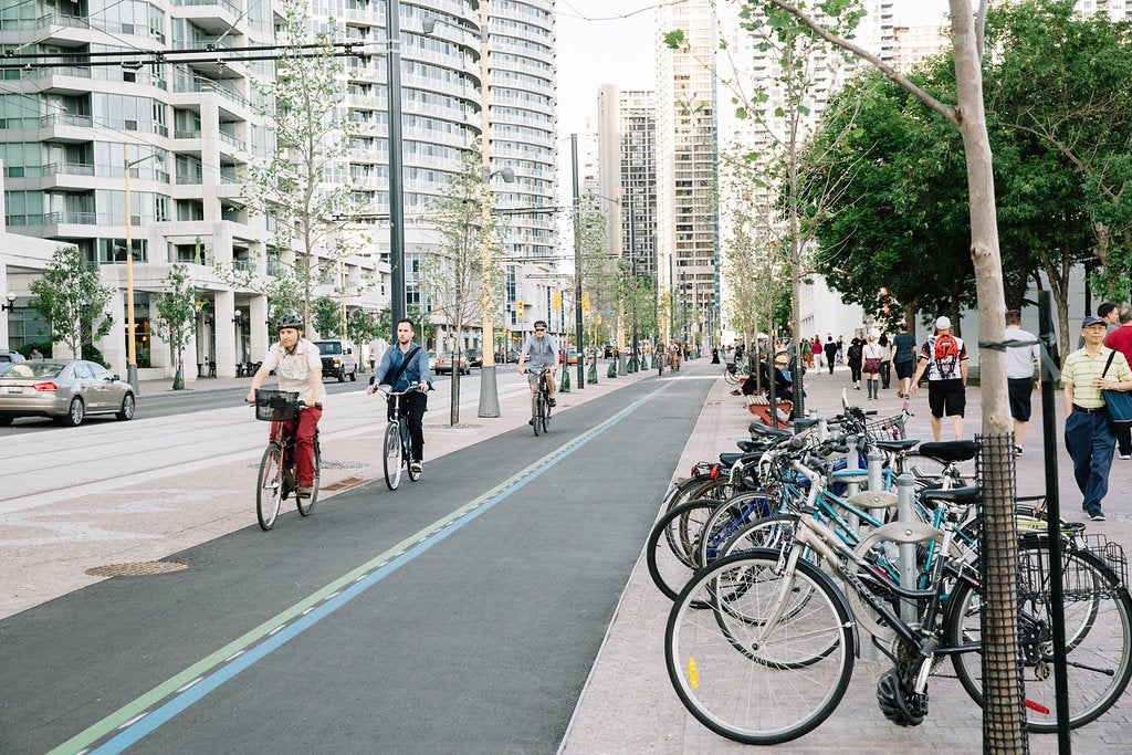 Toronto's new Queens Quay includes a multi-use path and generour pedestrian promenade. (Image credit: Connie Tsang for Waterfront Toronto)