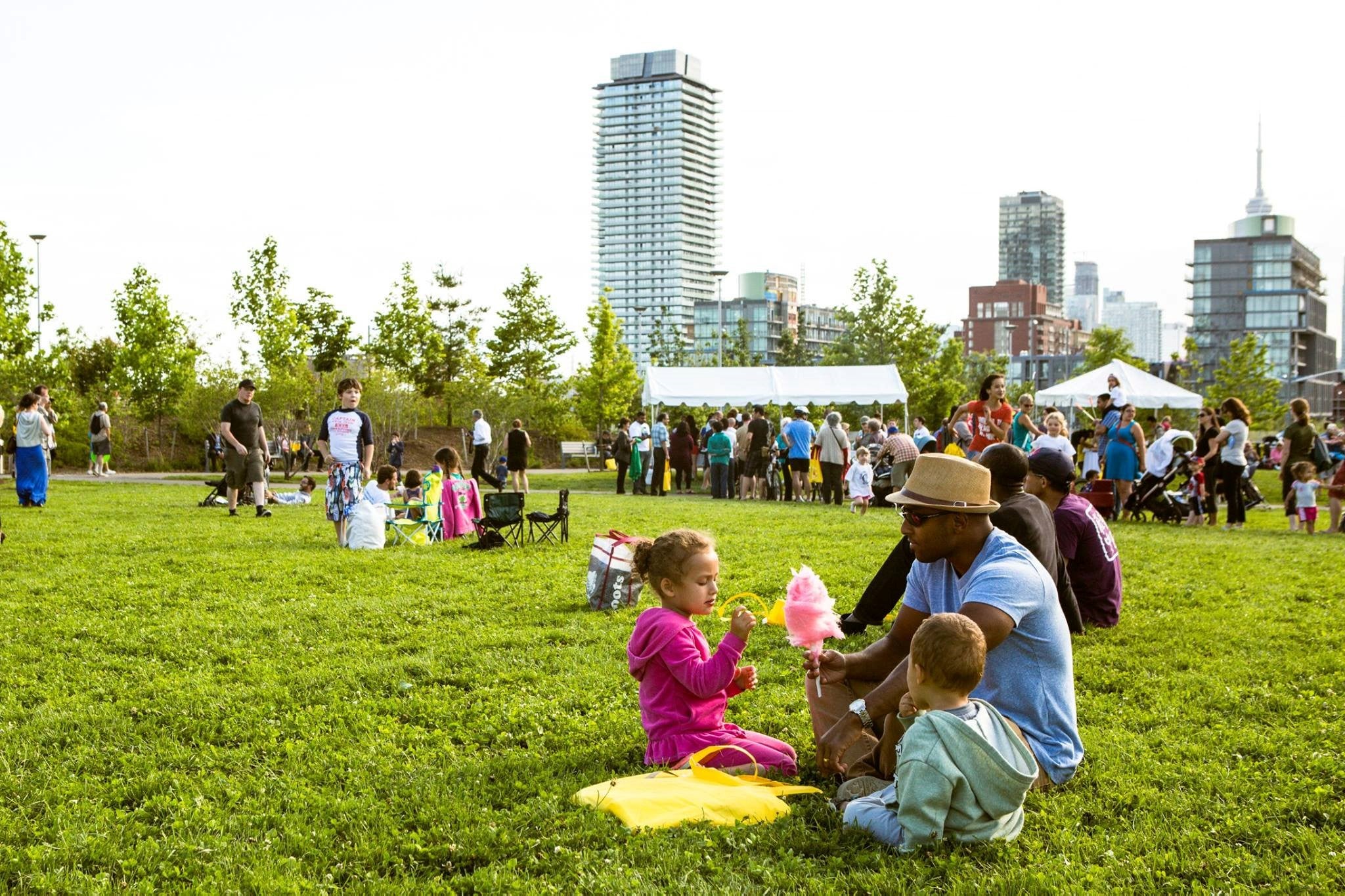 Family and friends gather for a picnic and celebration in Corktown Common.