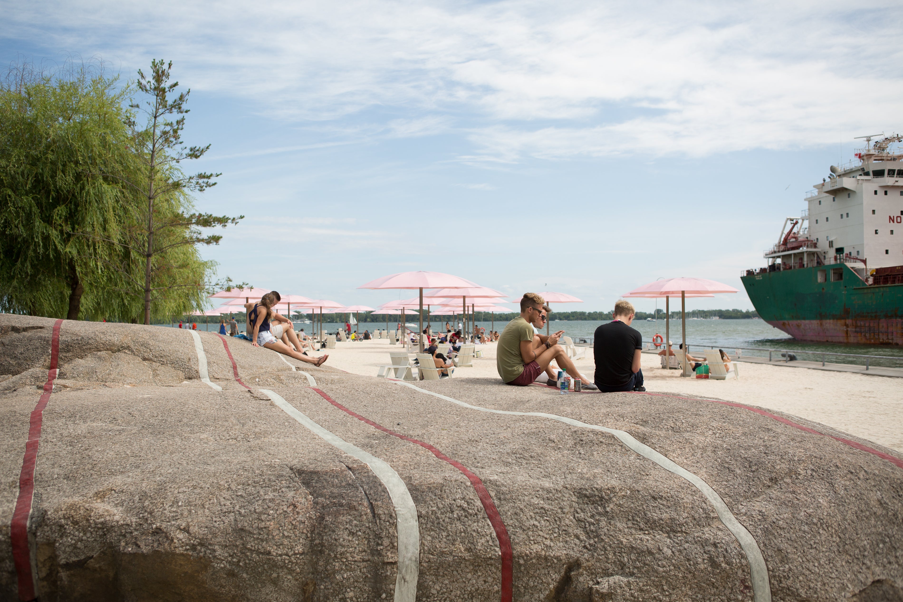 Giant candy striped rocks at Sugar Beach are a perfect resting place.