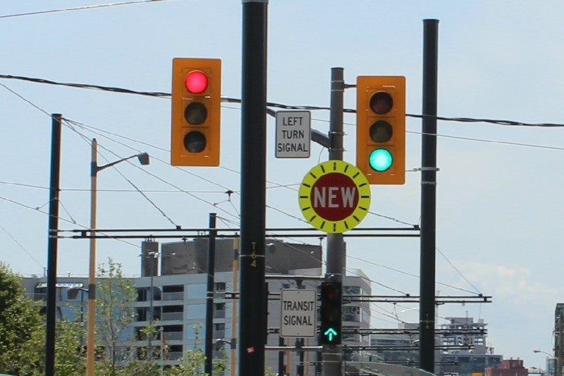 New traffic signals and signage on the new Queens Quay