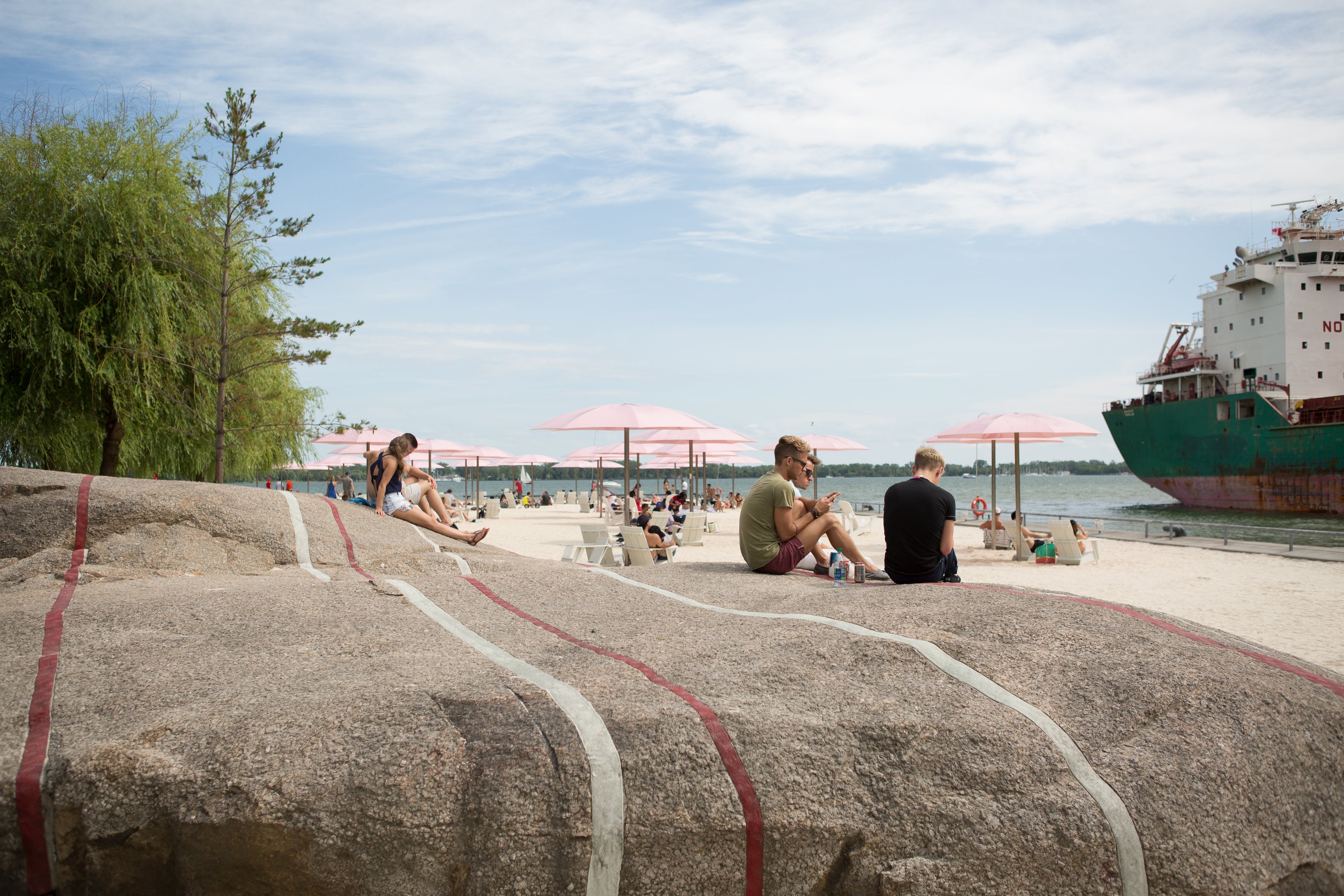 People enjoying Sugar Beach.