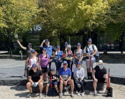 a group of volunteers doing a waterfront clean-up