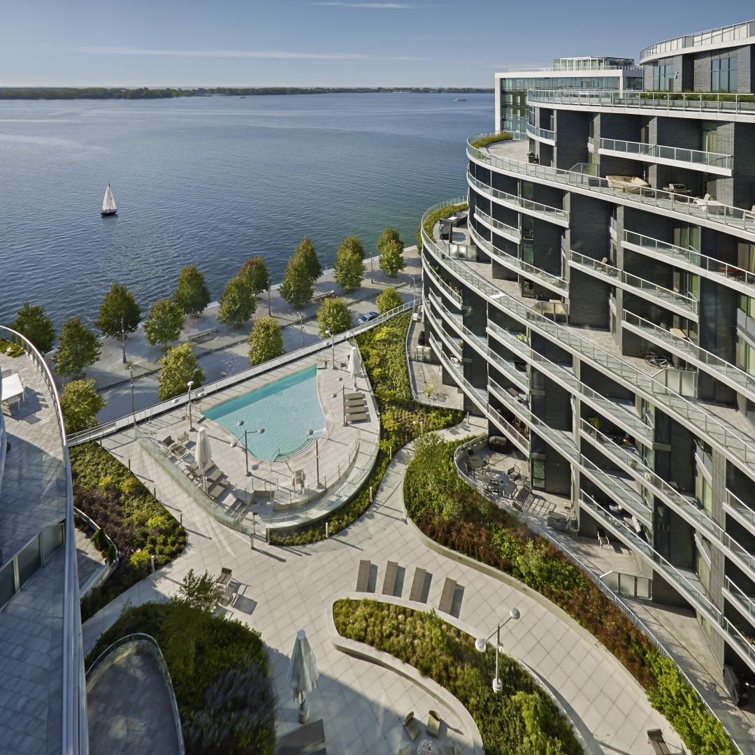 the exterior and rooftop terrace of Aquavista looking towards the lake