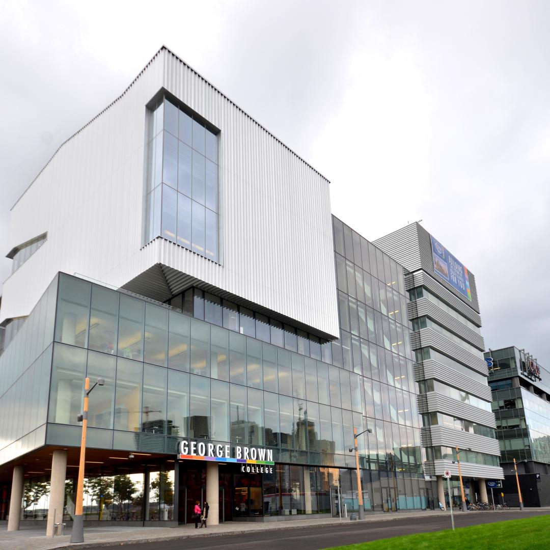 a daytime photo showing the exterior of the George Brown College waterfront campus building