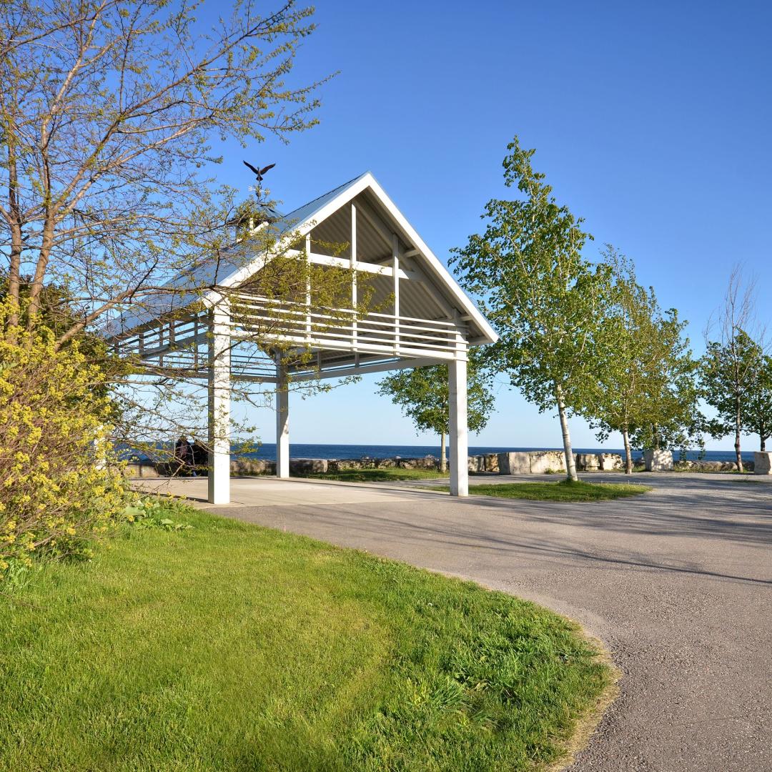 a gazebo next to a pedestrian and cycling trail and Lake Ontario