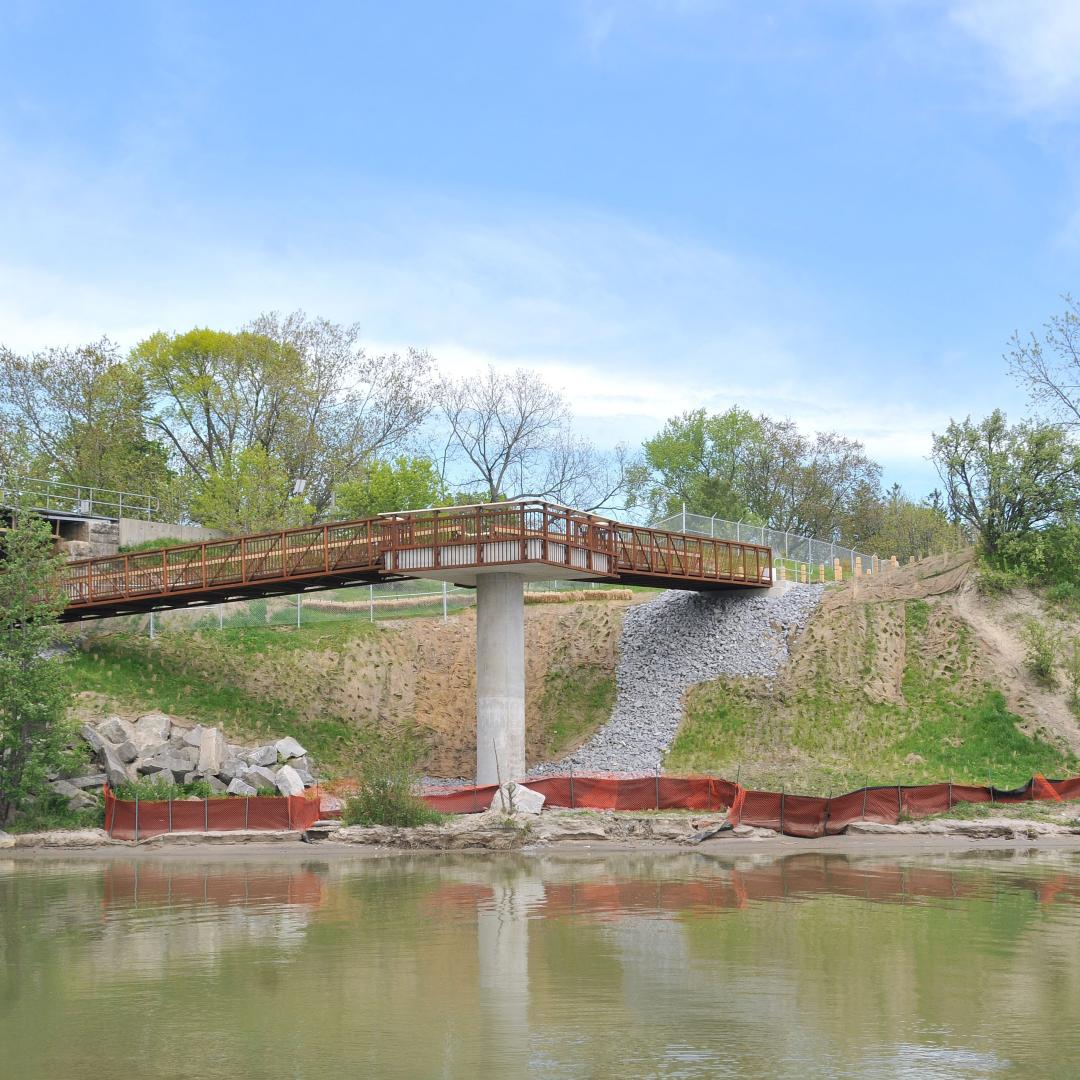 a bridge connecting the pedestrian and cycling trail over the Rouge River