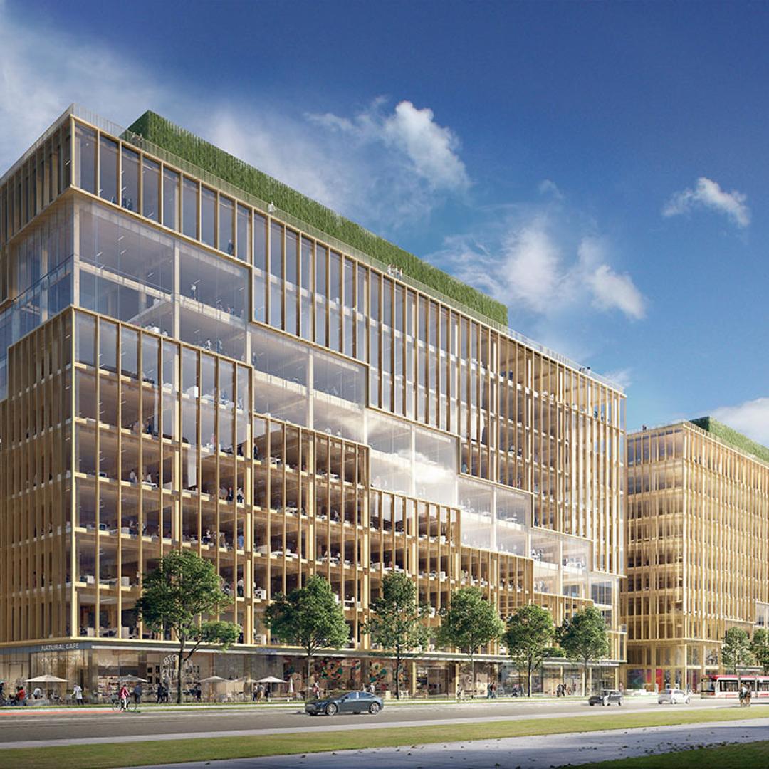 Rendering: a mass-timber building with floor to ceiling windows on every level. 