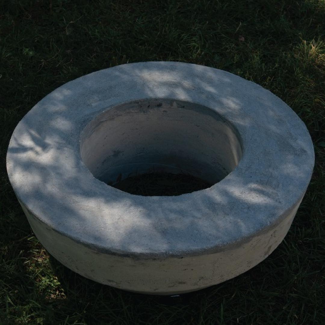 a circular object with a large whole in the centre