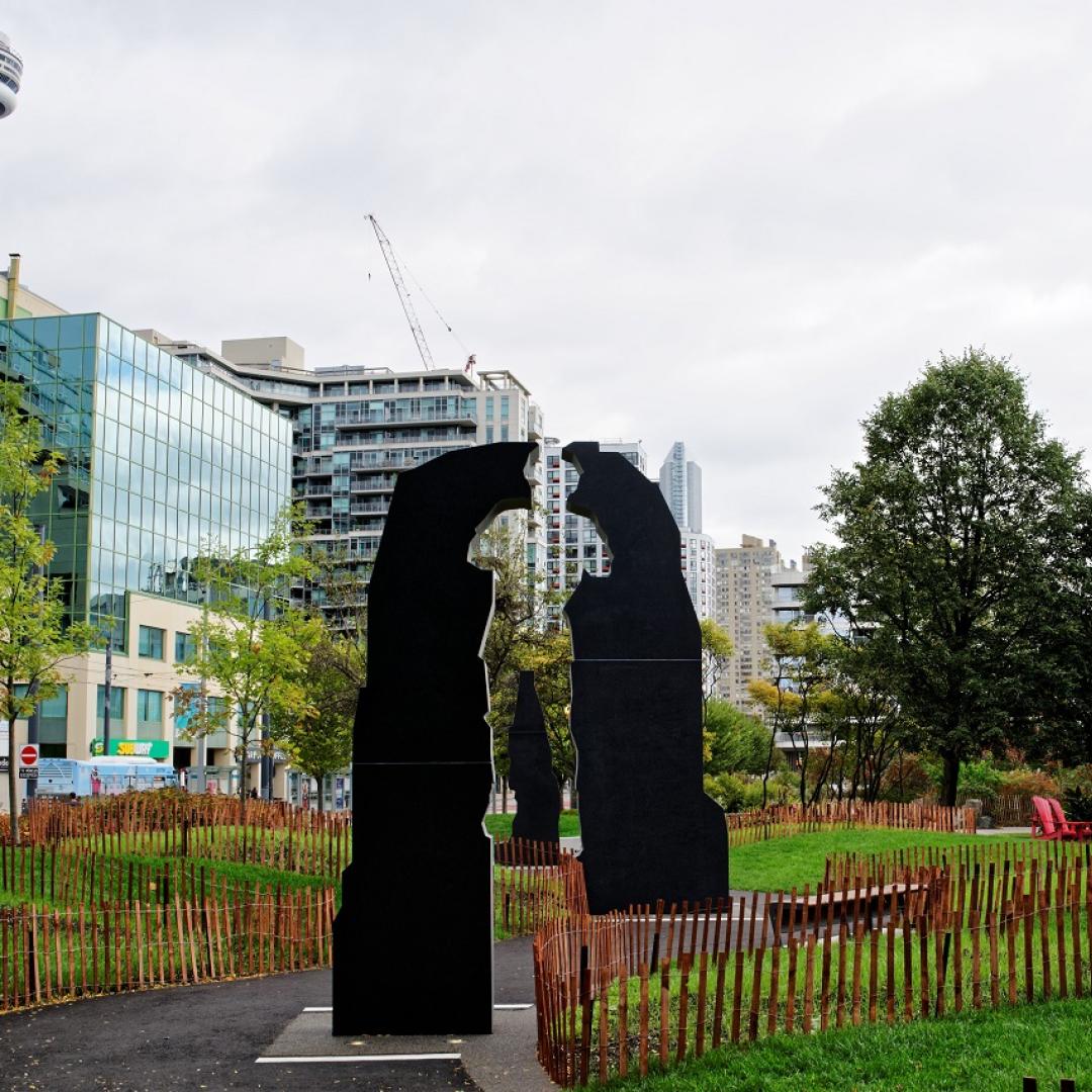 Black granite slab statue that resembles silhouette of Terry Fox