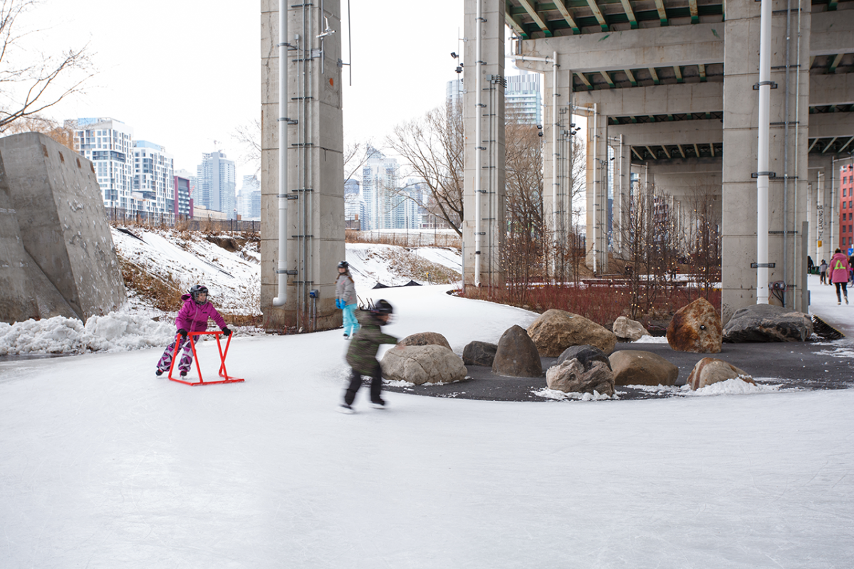 kids skating outdoors on The Bentway trail