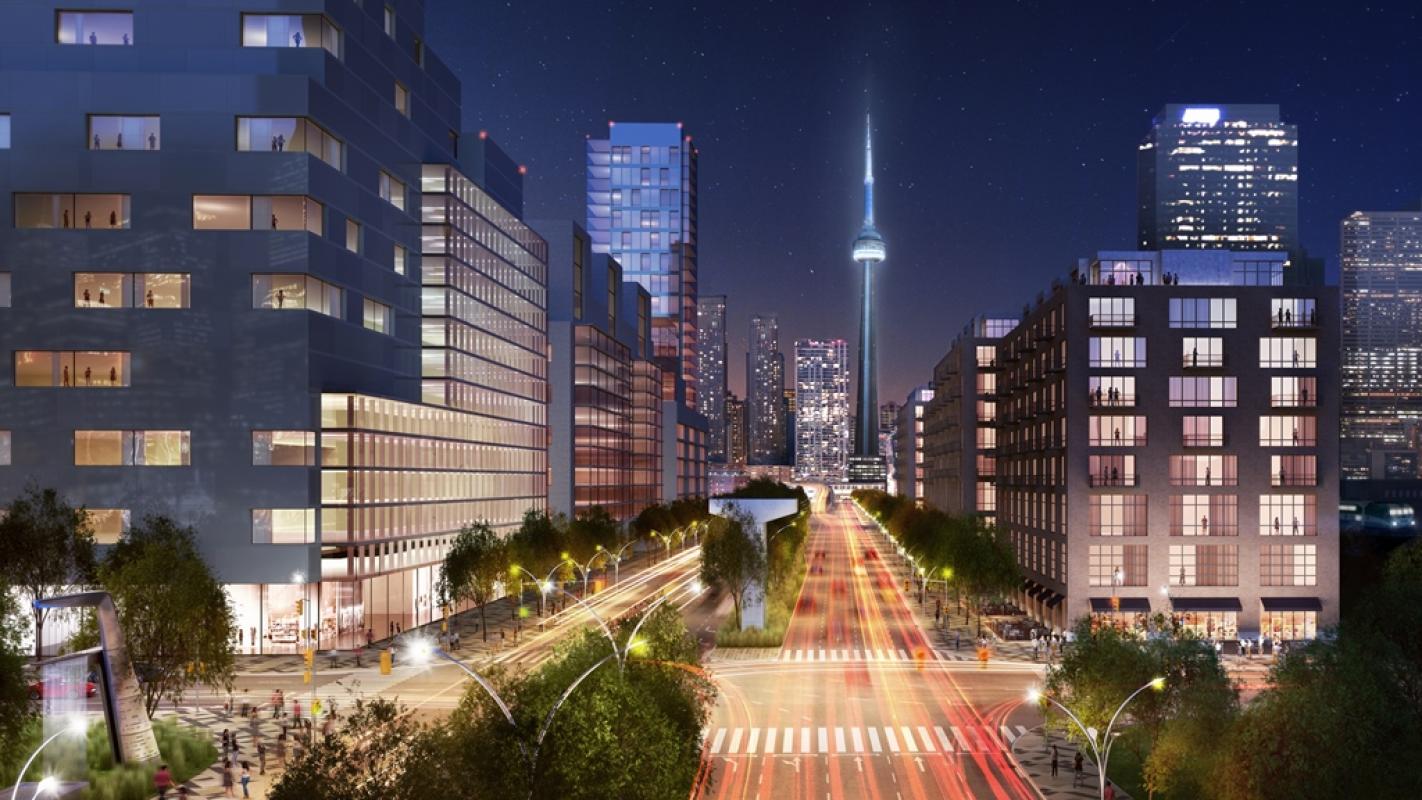 a rendering showing a street at night with the CN Tower and buildings in the background