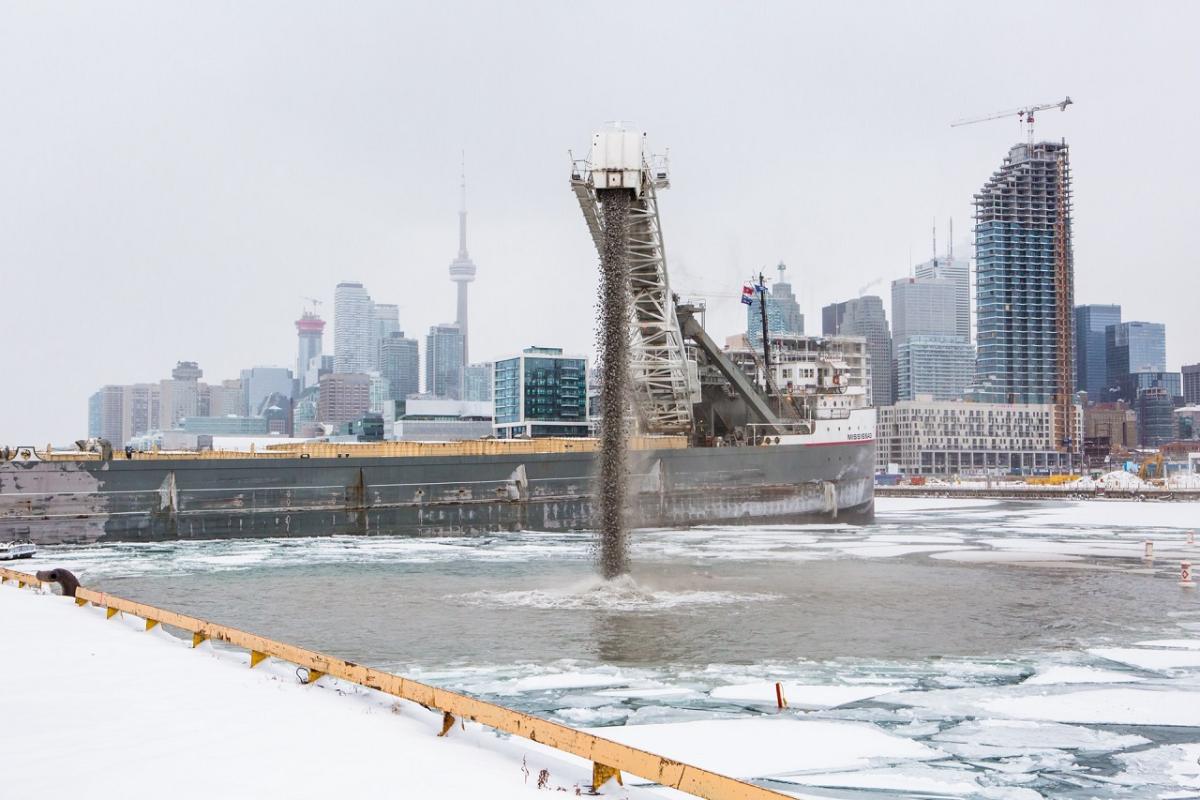 photo showing construction equipment in icy water