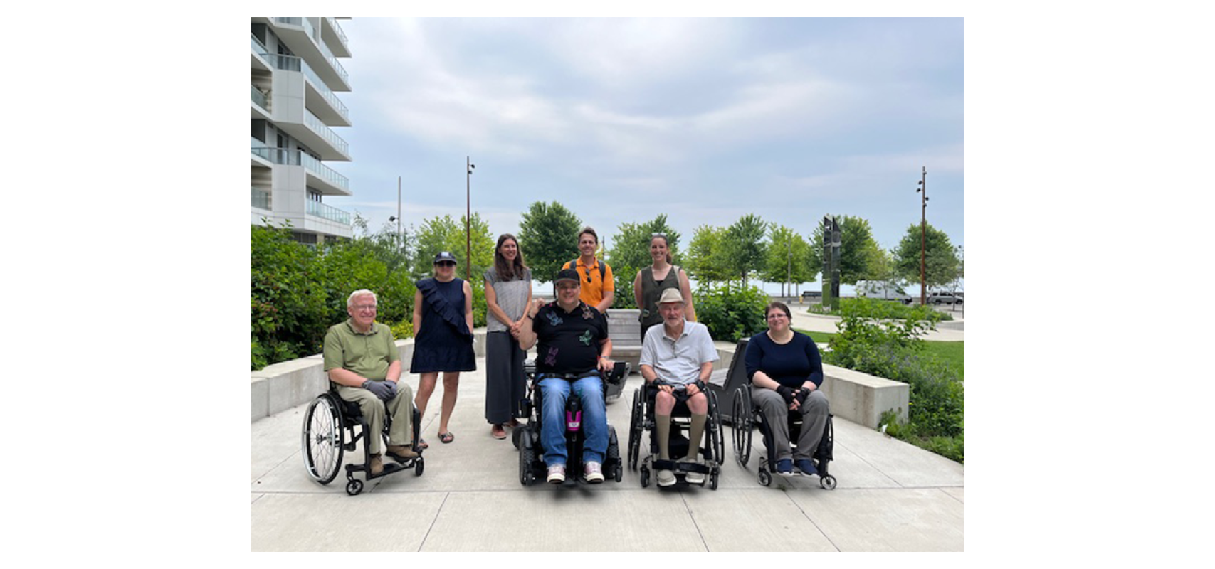 Waterfront Toronto staff and Accessibility Advisory Committee members toured some of our completed East Bayfront projects in 2024 and posed for the camera. Back left to right: Pina Mallozzi (WT), Kasia Gladki (WT), Roman Romanov (AAC), Vail Zerr (WT). Front left to right: Bruce Drewett (AAC), Chris Stigas (AAC), Dan Euser (AAC) Diane Kolin (AAC) Missing: Amanda Karahanas (AAC), Ipek Kabatas (AAC).