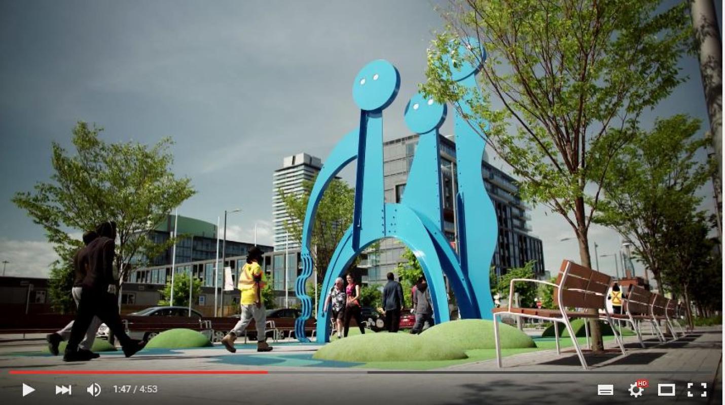 a public art installation of large blue figures