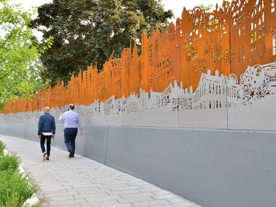 image of long linear artwork that pays homage to the area’s history. The piece features an expanded focus on the Blackburns