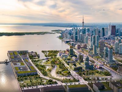 aerial view of the city and rendering shows future waterfront art trail