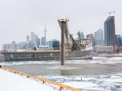 photo showing construction equipment in icy water