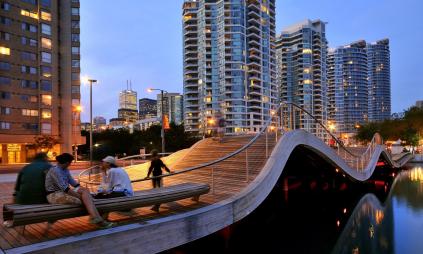 people sitting and enjoying the Simcoe WaveDeck at dusk