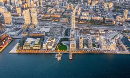 aerial photo of the East Bayfront precinct showing buildings, new parks and the water's edge