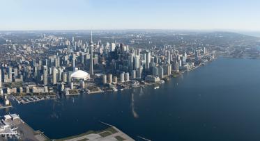 An aerial panorama of Toronto's Waterfront, seen from the lake.