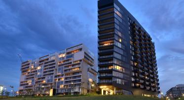 A photo showing the exterior views of the River City Development at dusk