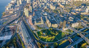 aerial photograph showing green space and the waterfront communities 