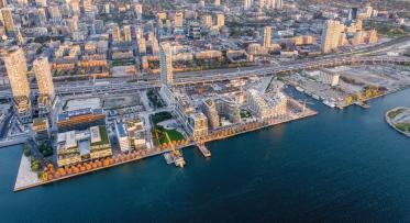 Aerial of Toronto's East Bayfront neighbourhood on the waterfront. 