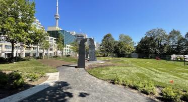 Granite slabs in a park form Terry Fox's silhouette.