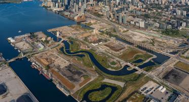 Aerial photograph of Ookwemin Minising with the Toronto cityscape in the background.